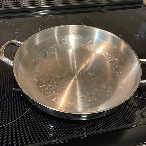 Shiny wok pan by Silampos 12” wide at top Two handles Some scratches on inside. - Picture 1 of 5
